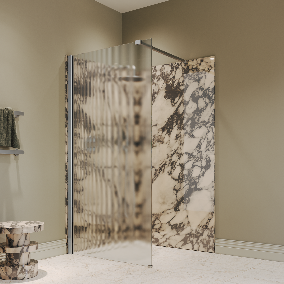 Corner walk-in shower with reeded glass panel and stainless upright against marble-effect wall panels
