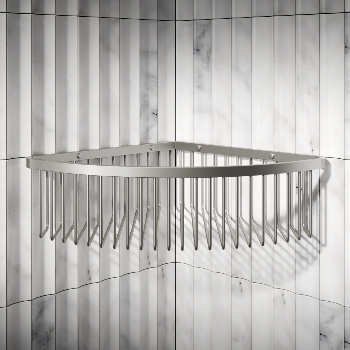 Polished nickel wire corner basket mounted on fluted marble-look tiles in a shower