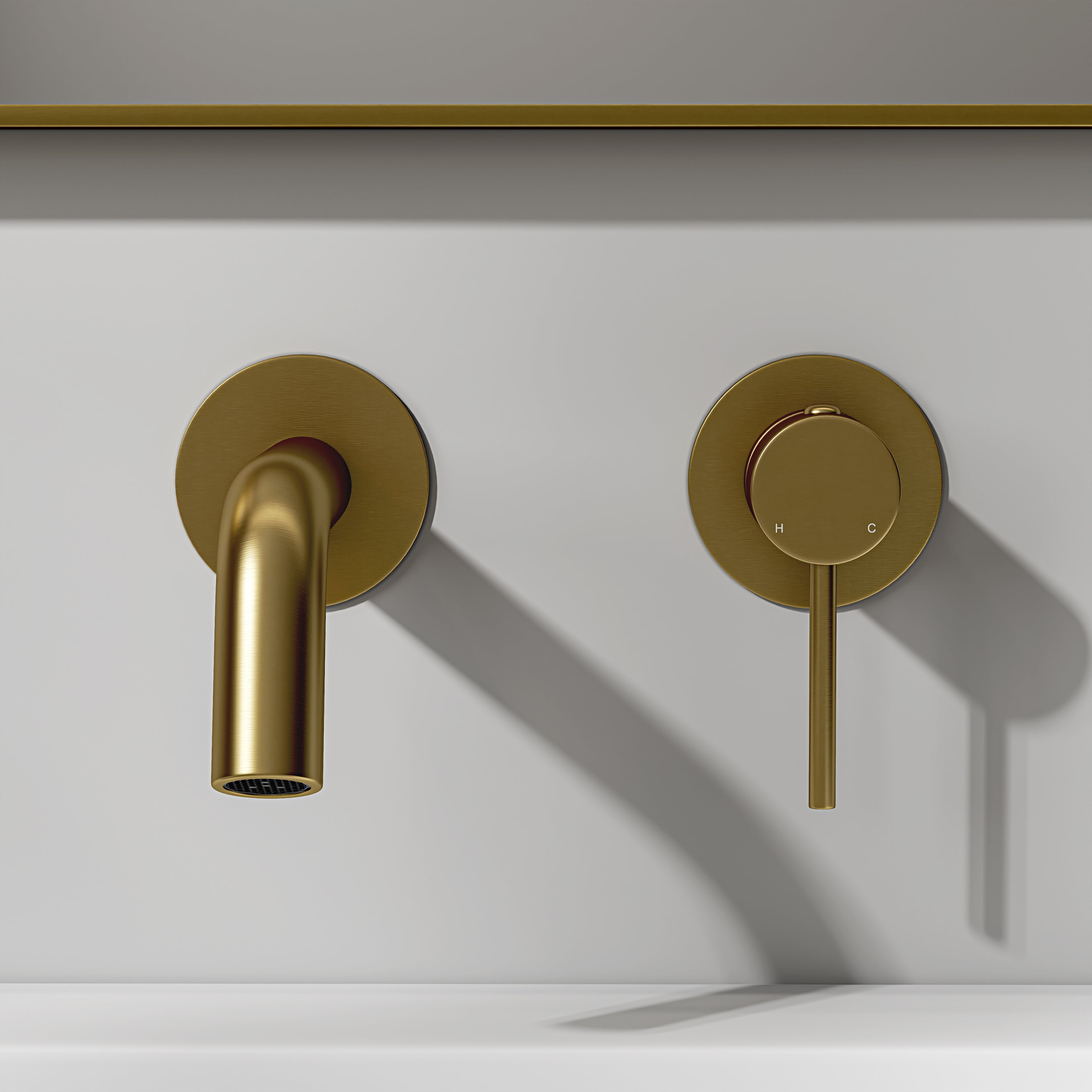 Nuvo Brushed Gold Short Projection Wall Mounted Basin Mixer Tap