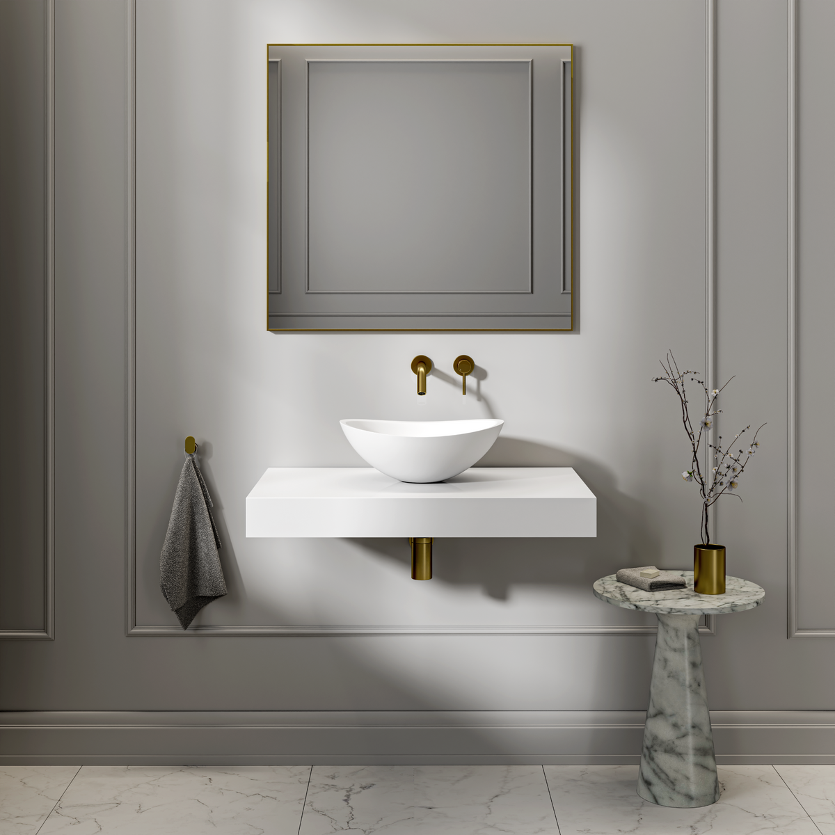 Oval white countertop basin on a floating white shelf with brass wall-mounted taps