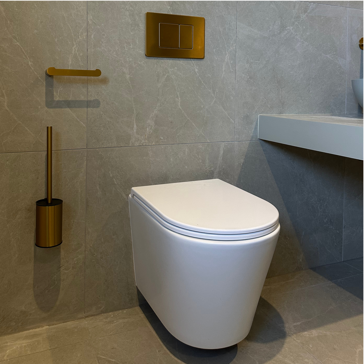 Nuvo Wall Hung Rimless Matte White Toilet with Concealed Frame Cistern & Brushed Gold Flush Plate