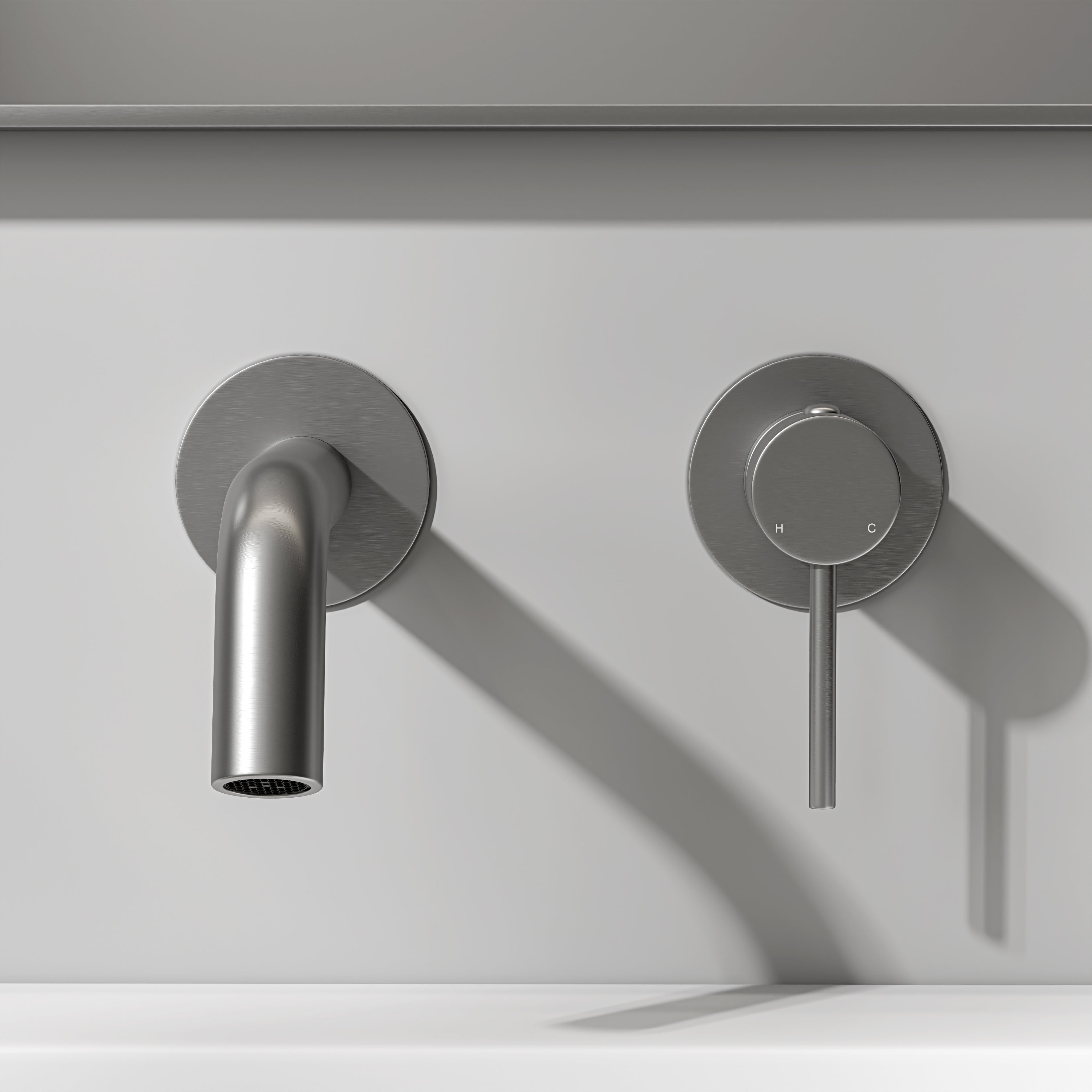 Nuvo Brushed Stainless Short Projection Wall Mounted Basin Mixer Tap